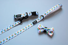 Load image into Gallery viewer, rainbow paw print dog collar dog lead and dog  bow tie
